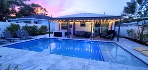 30-Foot-Long Covered Patio with Plenty of Space for Dining, Chilling & Grilling