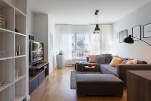 Spacious, lively living room overlooking on the city