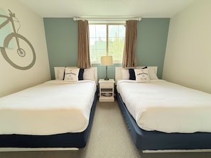 Second Bedroom: 2 Double Beds (Full size) and smart TV.
