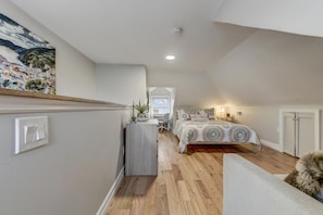 Enjoy privacy in the secondary, loft-style bedroom.