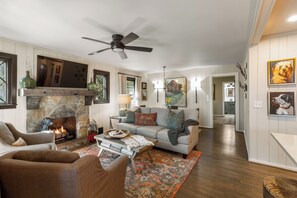 Comfortable living room with tongue and groove walls