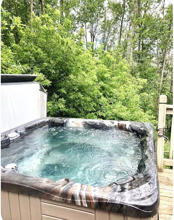 8 person Hot Tub on back deck, enjoy the view of ravine as you soak