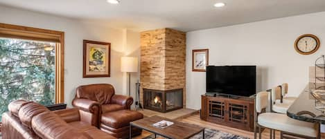 Relax by the fire and enjoy the newly refreshed living room.