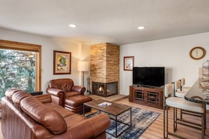Relax by the fire and enjoy the newly refreshed living room.
