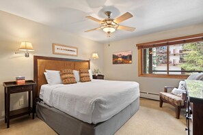 This bedroom has a comfortable king bed, a flat screen TV and spacious en-suite bath.