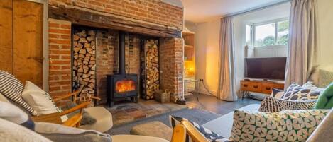 Willow Cottage: The sitting room has wood burning stove