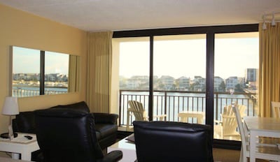 Beautiful condos with outside pool and 5 minute walk to beach access.