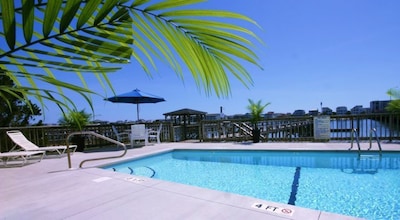 Beautiful condos with outside pool and 5 minute walk to beach access.