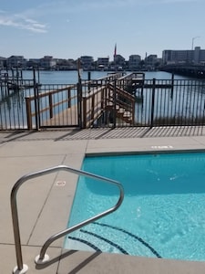 Beautiful condos with outside pool and 5 minute walk to beach access.