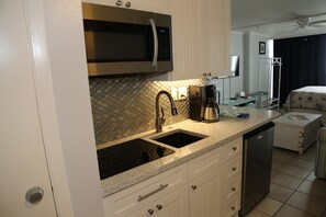 Small kitchen with dorm-sized appliances;  Full size Mr. Coffee coffee maker.  