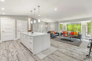 Bright, modern kitchen with large island 