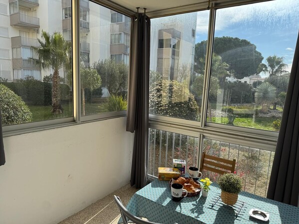 Glazed loggia facing south east with unobstructed view of vegetation 