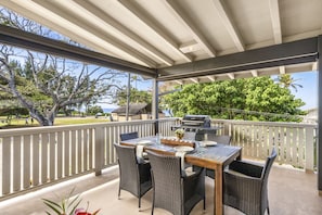 Dining area with ocean and park view