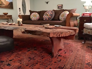 Living Room with large handmade, live wood coffee table