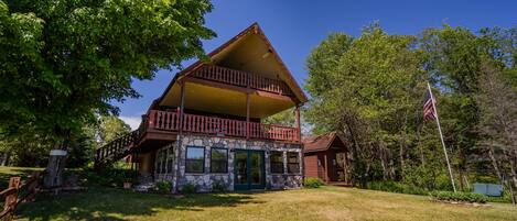 Dancing Bear Lodge view from lakefront of yard, walk out rec room, covered decks