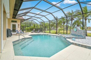 VILLA MARGARETHA - Private heated pool with waterfall, covered outdoor seating and dining area, lounge area and BBQ Grill complete the large screened lanai.