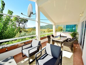 Plant, Furniture, Sky, Chair, Shade, Wood, Interior Design, Table, Building, Houseplant