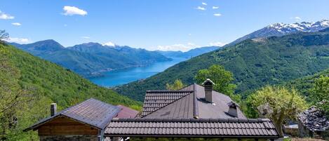 Sky, Mountain, Cloud, Plant, Property, Ecoregion, Green, Natural Landscape, Azure, Highland