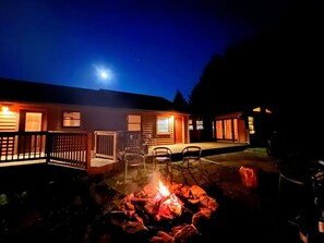 The backyard fire pit is perfect for warm evenings of laughter and love