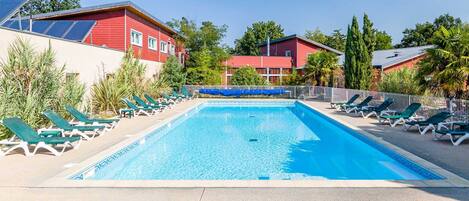 Relax by the shared outdoor pool!