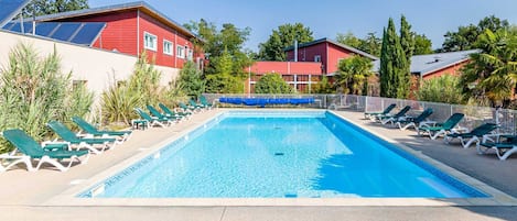 Relax by the shared outdoor pool!