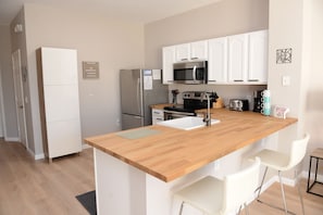 Kitchen with bar stools