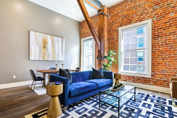 Open-concept living, kitchen, and dining area with ample seating for you and your guests. 55” Samsung Smart 4K TV for streaming and DIRECTV Entertainment. Dining table seats four. Enjoy plenty of natural light!