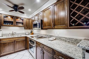 Updated quality kitchen with dishes, basic appliances and all you need to cook meals at home.  No food items are included.