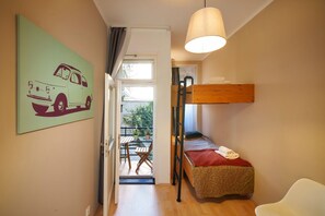 Bedroom 2 with bunk bed and small balcony