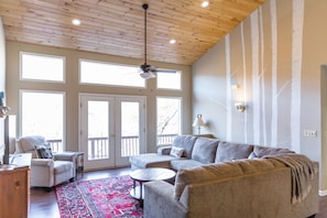 The living room with views out to the ski slopes.