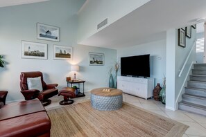 Living room with large flat screen tv