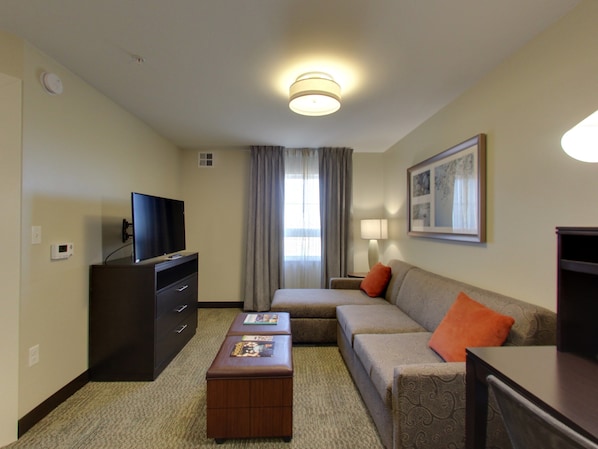 Sink into the cozy sofa after a day exploring the area.
