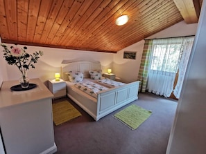 Schlafzimmer mit Balkon