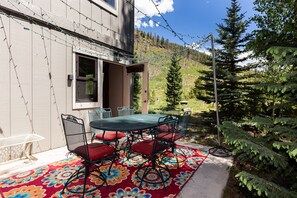 The patio features two seating areas.