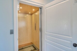 An elevator will assist you in moving between the 3 levels of this home.