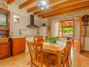 Countertop, Cabinetry, Furniture, Table, Chair, Kitchen, Wood, Kitchen Appliance, Lighting, Interior Design