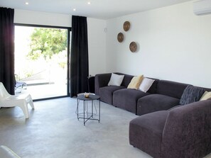 Furniture, Room, Living Room, Property, Floor, Interior Design, Couch, Table, Building, Coffee Table