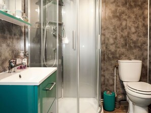 Bathroom, Room, Green, Property, Turquoise, Interior Design, Plumbing Fixture, Tile, Wall, Architecture
