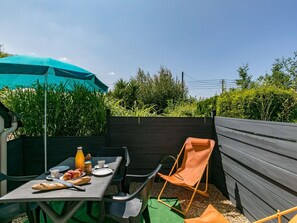 Sky, Property, Table, Outdoor Furniture, Shade, Outdoor Table, Chair, Tree, Leisure, Plant