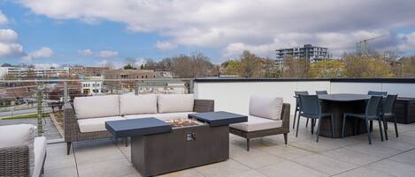 Gather around our gas fire pit on our roof top patio and enjoy the views!