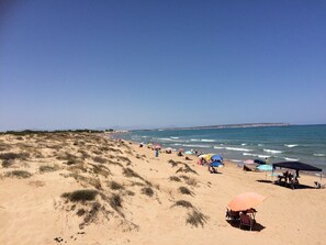 BLUE FLAG BEACH 3 MILES IN BOTH DIRECTIONS