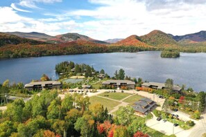 lake with resort and canoe