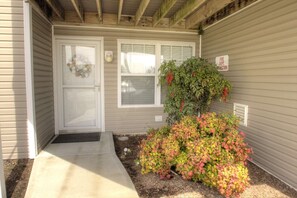 Enter your ground floor 2 BR condo.