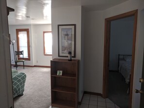 Welcome in to your temporary home. Kitchen to the far right, bedroom next to it.