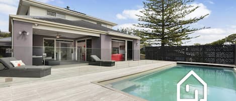 The backyard offers a completely private north facing deck and stunning pool