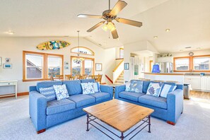 Top-Level Living Room with Deck Access **Fireplace seen in the photo is not operational