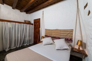 "Natura cottages at Makris Gialos" 
Master Bedroom with garden & mountain view 