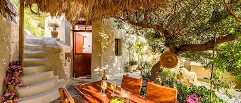 "Natura cottages at Makris Gialos"
Patio in nature with garden & mountain view 