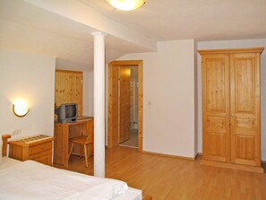 Room, Property, Furniture, Floor, Bed, Building, Wood Stain, Hardwood, Wall, Interior Design