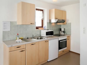 Room, Furniture, Property, Kitchen, Cabinetry, Interior Design, Building, Major Appliance, Countertop, House